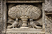 Prambanan - Candi Lara Jonggrang, kinara-kinari panels a composition of a lion with the tree of heaven and a pair of kinnara. 